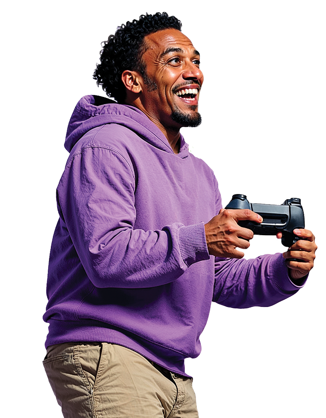 A person smiling while holding a video game controller.