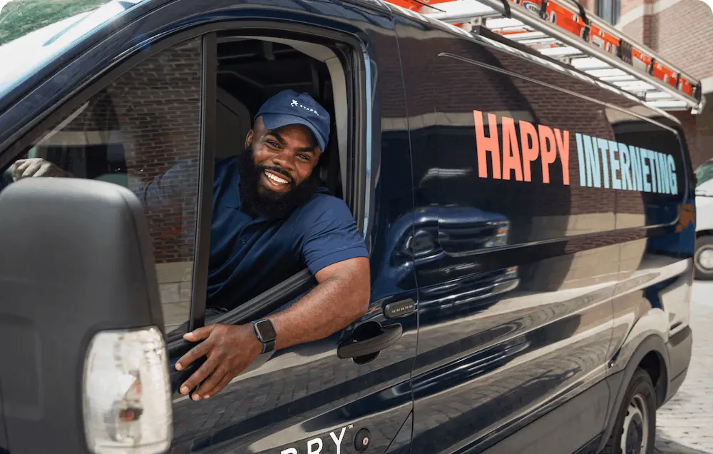 A starry technician driving a van